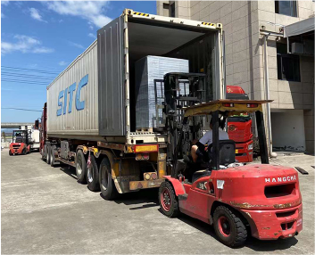 Dedicated Workers Load Two Containers for Export and Two Trucks for Domestic Delivery in Sweltering Heat
